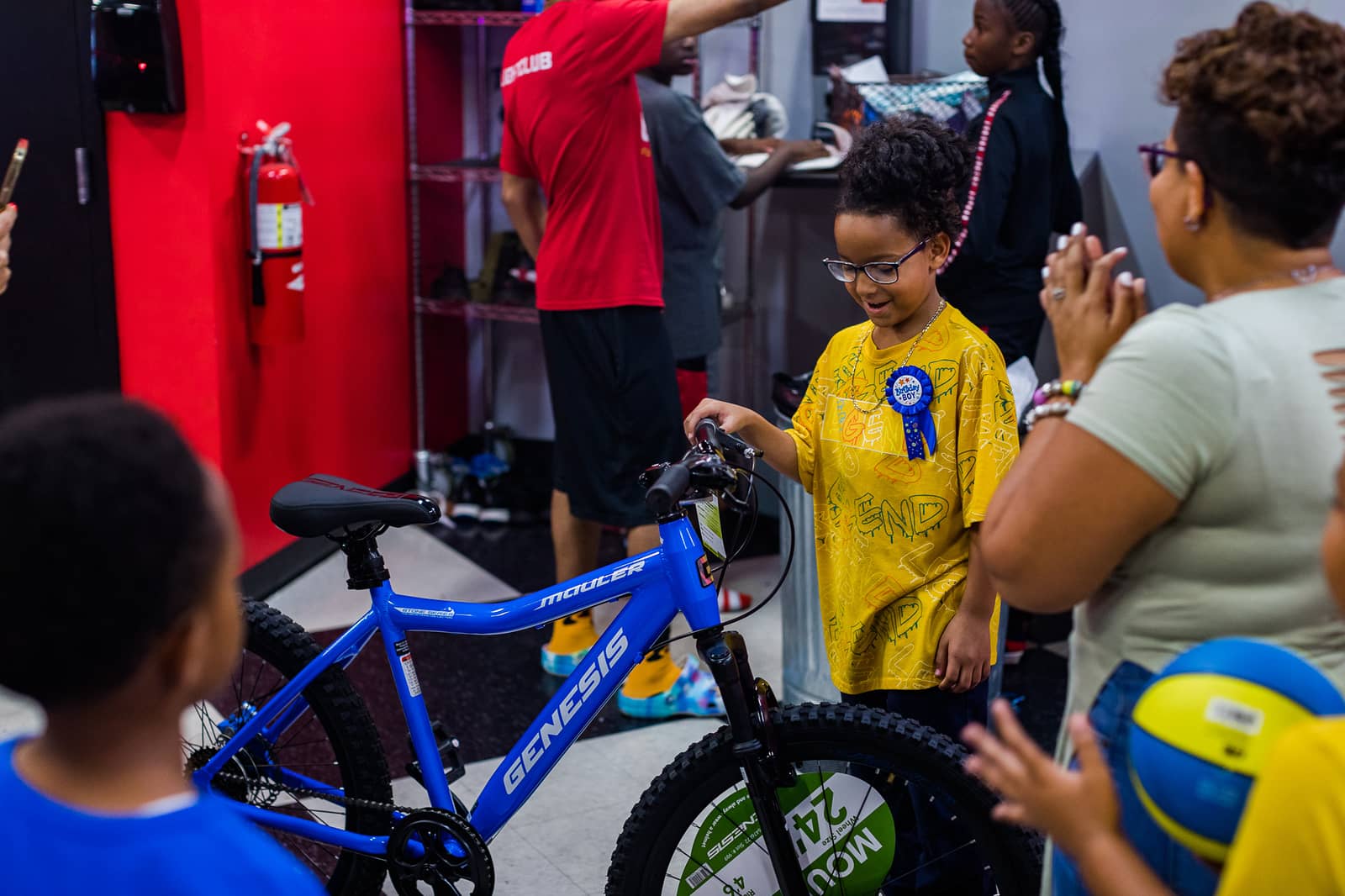 Little Boy Receiving a Bicycle for his Birthday at Birthday Blessing